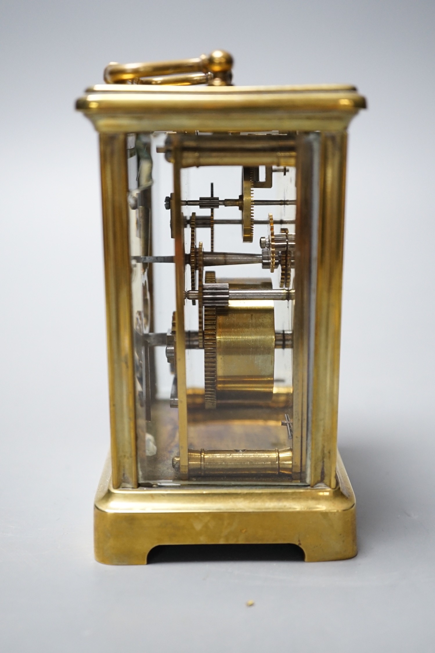 A brass carriage timepiece by Saqui & Lawrence of London, 11.5cm tall